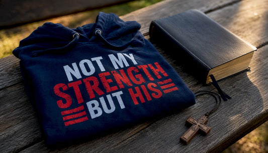 Christian hoodie with faith message and Bible on table