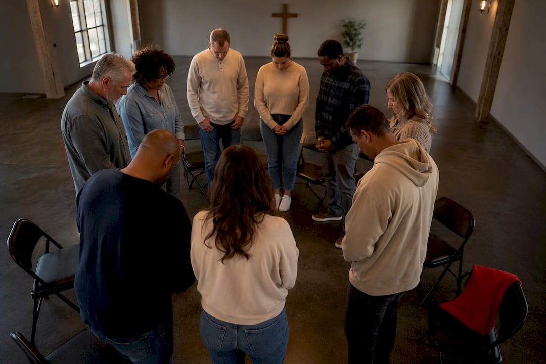 Small group praying together for America